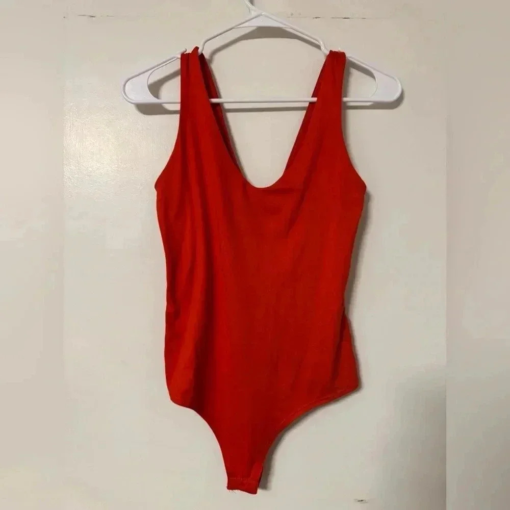 Red body suit with low back